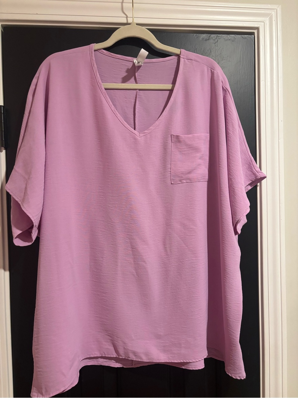 V-Neck Short Sleeve Pocket Tunic - Light Lilac.It's a small but will fit m,l, xl